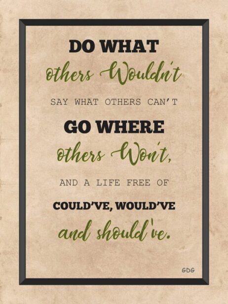 A quote is written in green ink on a brown background.