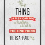 A quote is written in black and red.