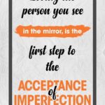 A poster with the words being the person you see in the mirror is the first step to the acceptance of imperfection.